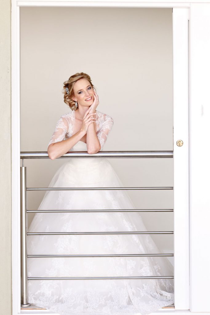 English bride in a white dress smiling at her Johannesburg Wedding Photographer