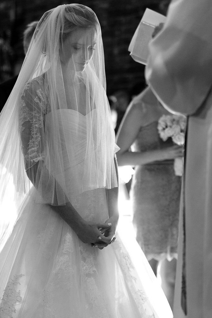 black and white image of bride in church at St George's Anglican Church Parktown Johannesburg