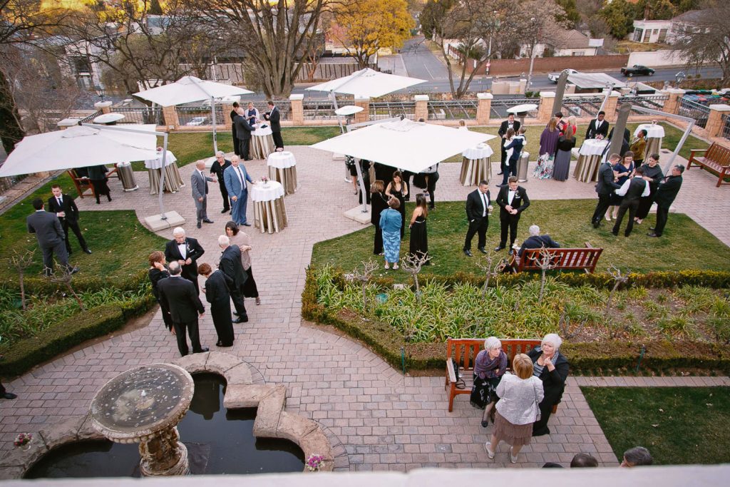 wedding guests standing at the Four Seasons Hotel The Westcliff
