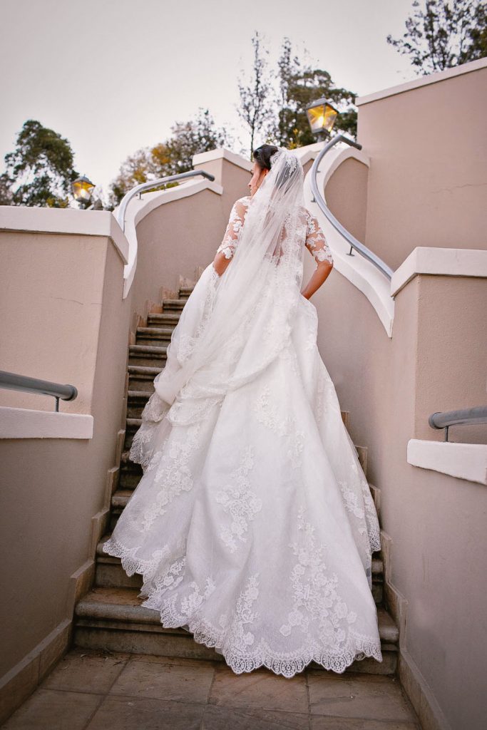 bride walking up the stairs at the Fourseasons Hotel The Westcliff Hotel Johannesburg