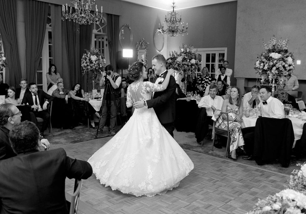 black and white dancing images of wedding couple at Four Seasons Hotel The Westcliff