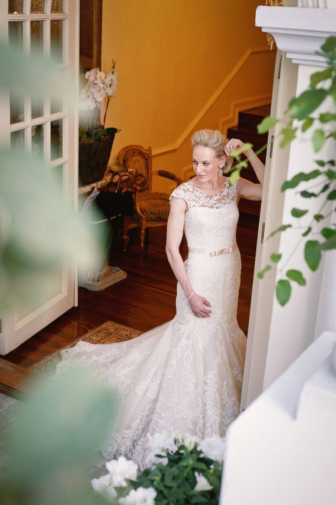 Bride standing at the front doors at Illyria House in Pretoria
