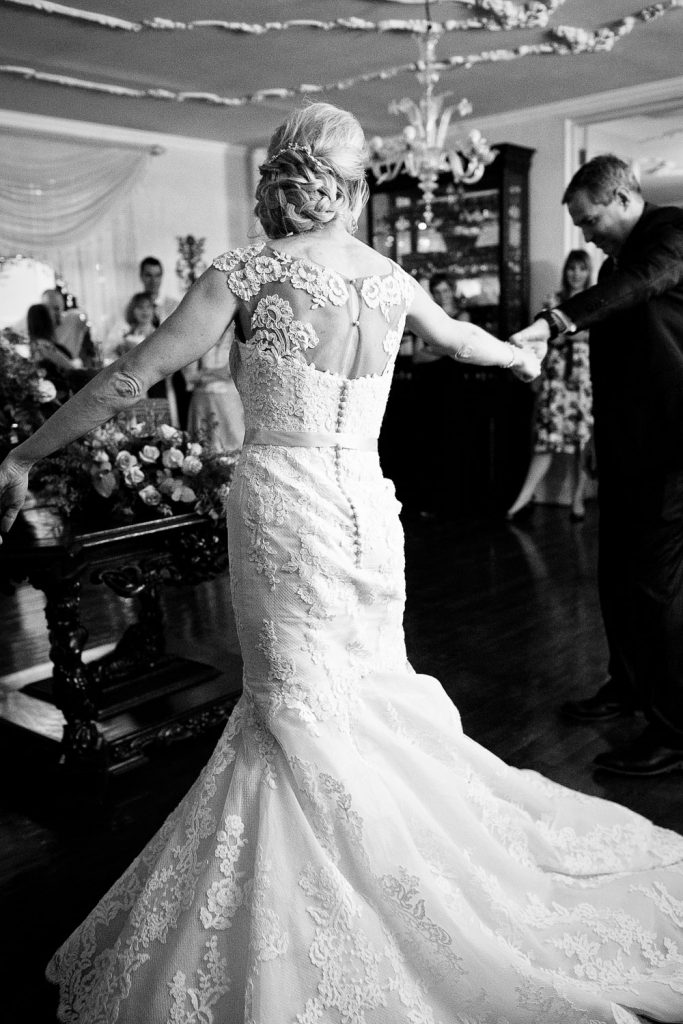 black and white dancing images of the wedding couple at Illyria House in Muckleneuk Pretoria