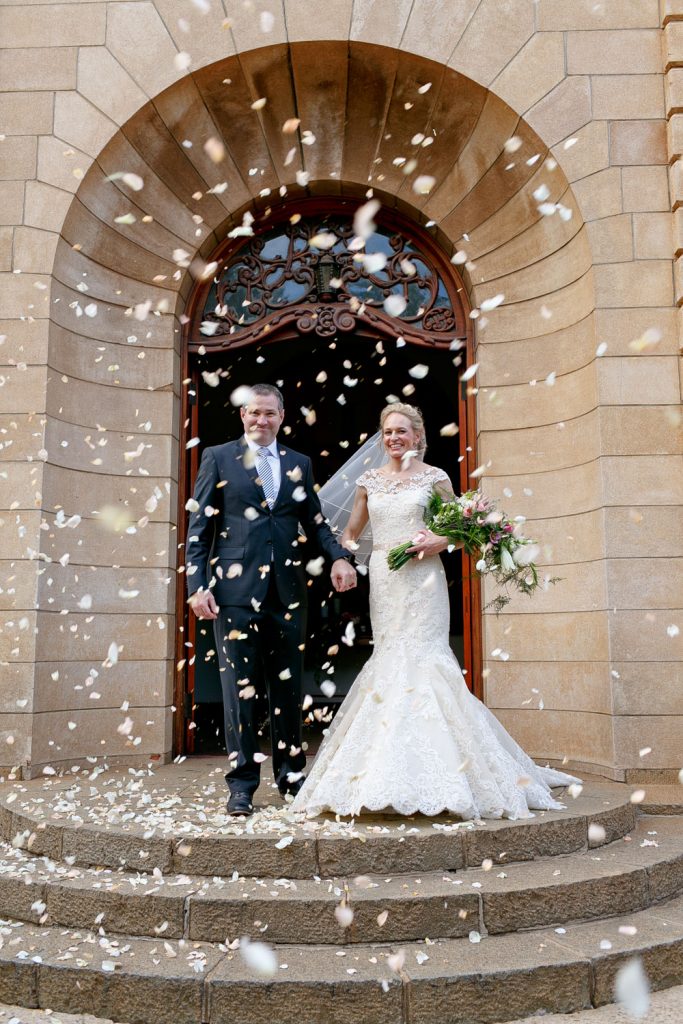 Bride and groom celebrating at Die Ooskerk in Pretoria