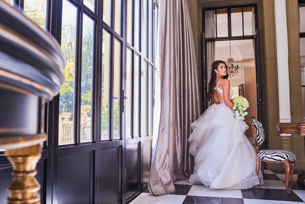 Bride walking down the corridor at  Le Chatelat Residence