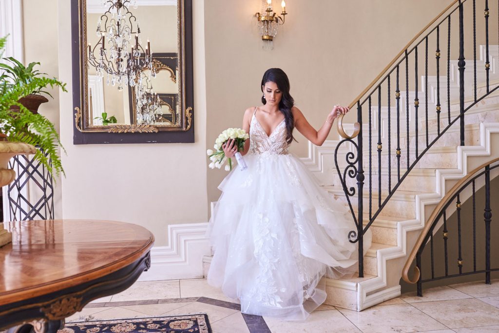 Bride walking down the stairs Le Chatelat Residence