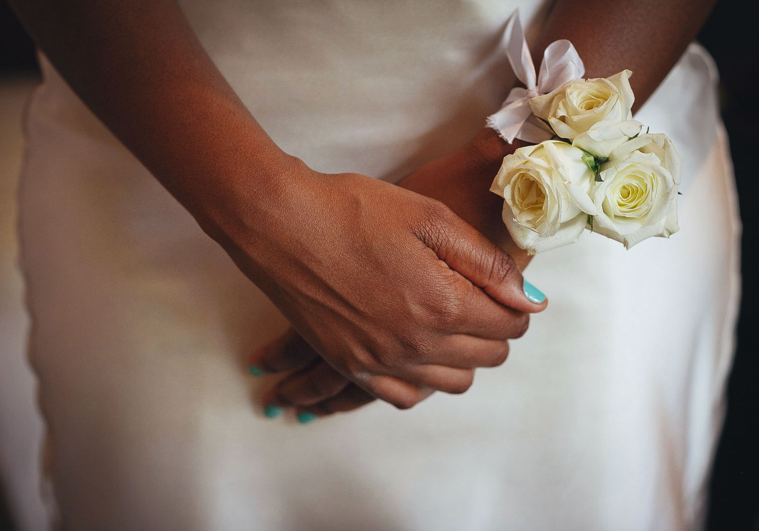 bridal hands and flowers at the red ivory lodge