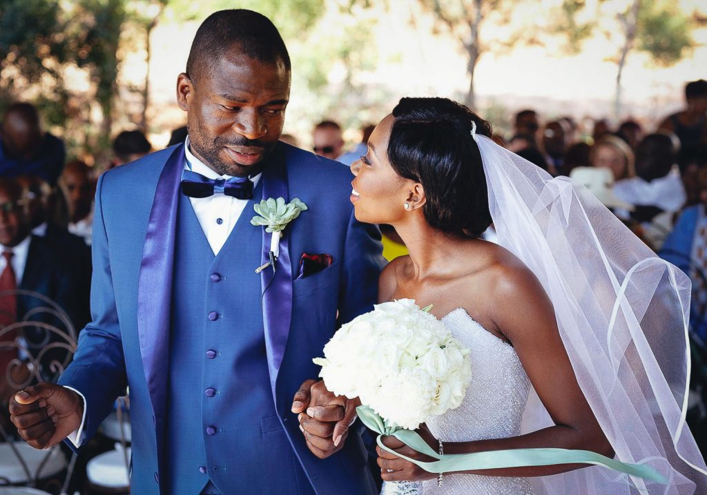 African wedding couple celebrating at the red ivory lodge