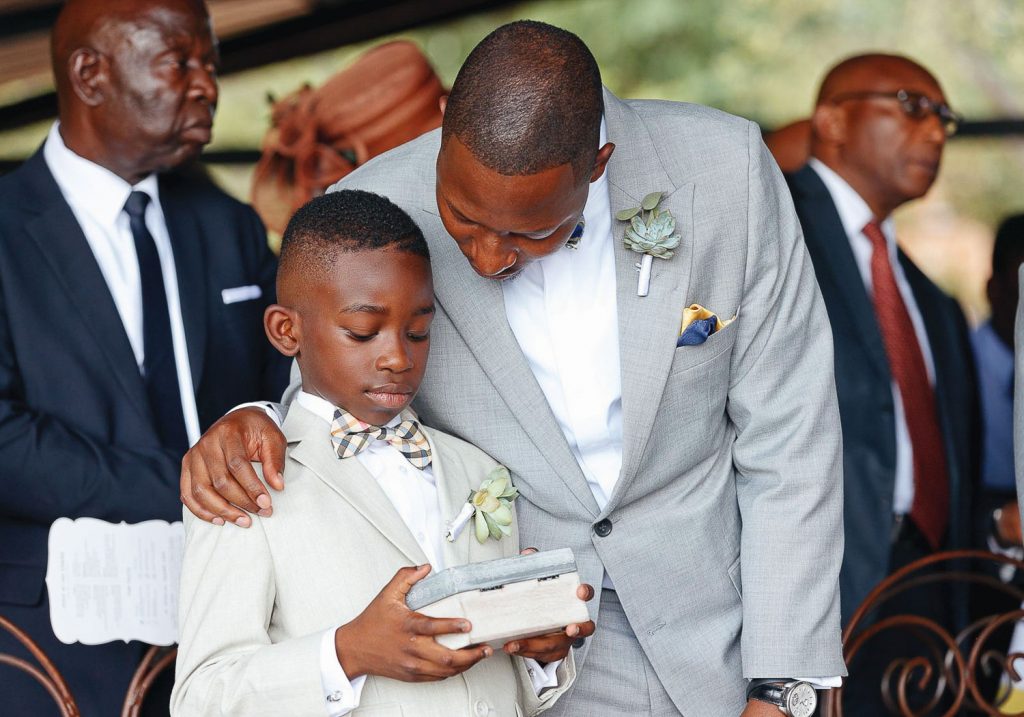 father talking to son at church