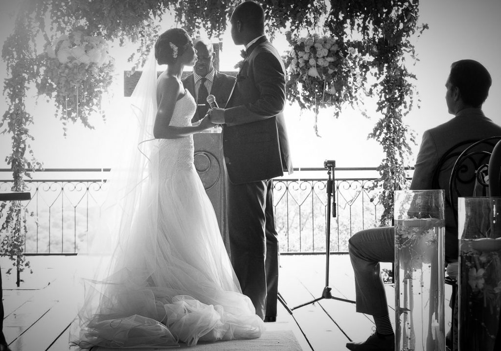 African wedding couple standing at the altar at Red Ivory Lodge