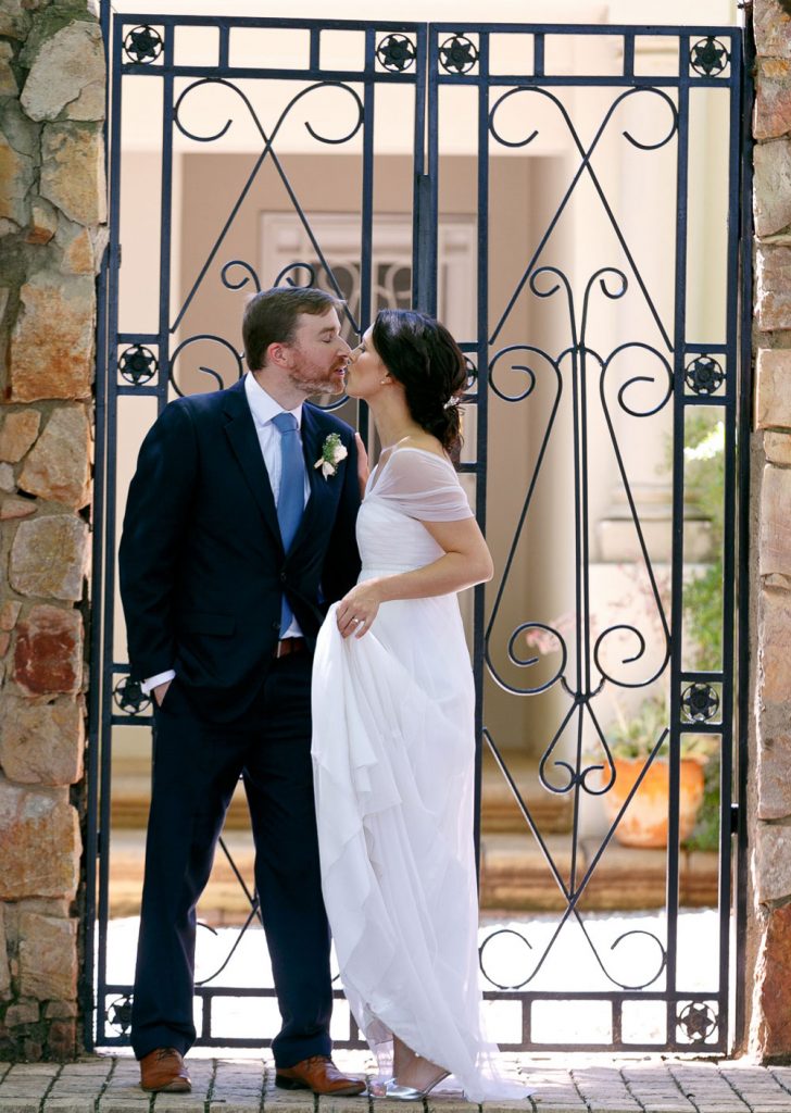 Johannesburg wedding photographer photographing a couple kissing in Parkview