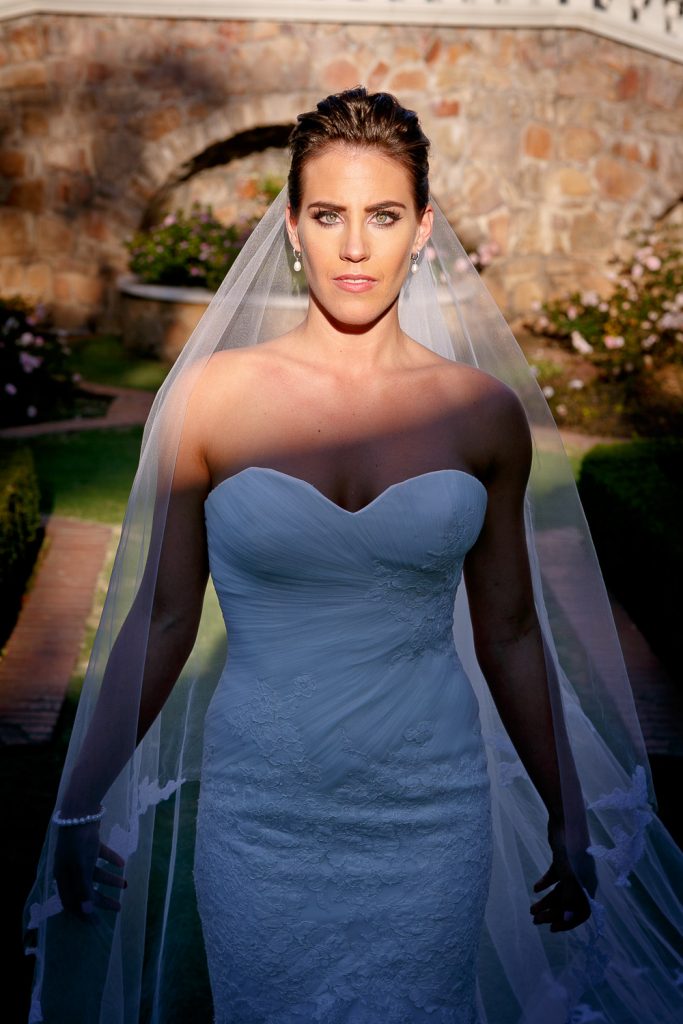 Bride standing in the sun at Summer Place Wedding Venue