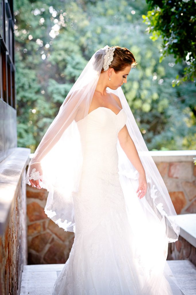 Bride standing in the sun at Summer Place wedding venue