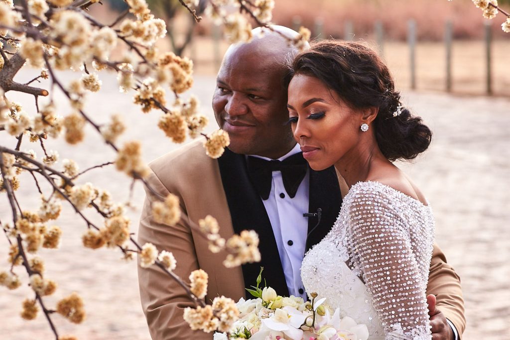 African wedding couple posing at Thaba ya Batswana Hotel wedding venue