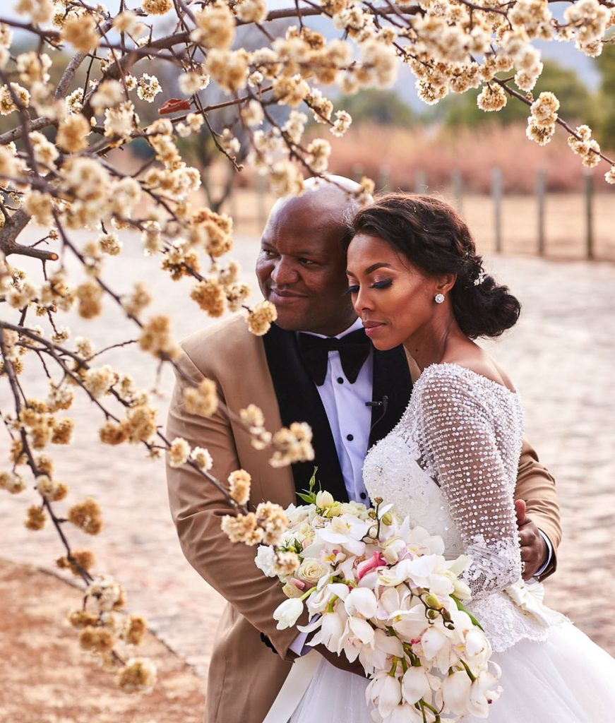 African wedding couple posing at sunset at Thaba ya Batswana wedding venue