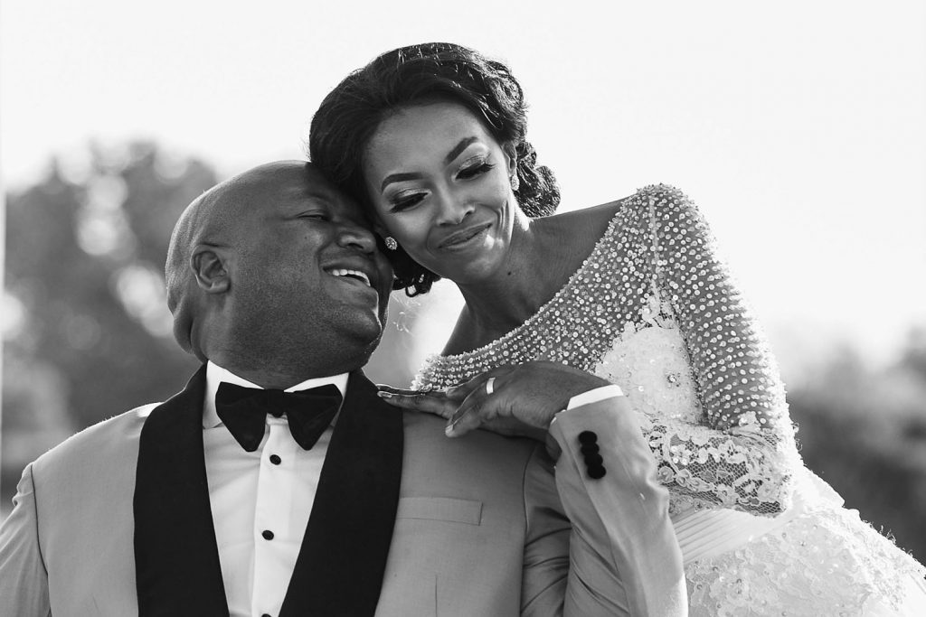 African wedding couple posing at Thaba Eco Hotel wedding venue