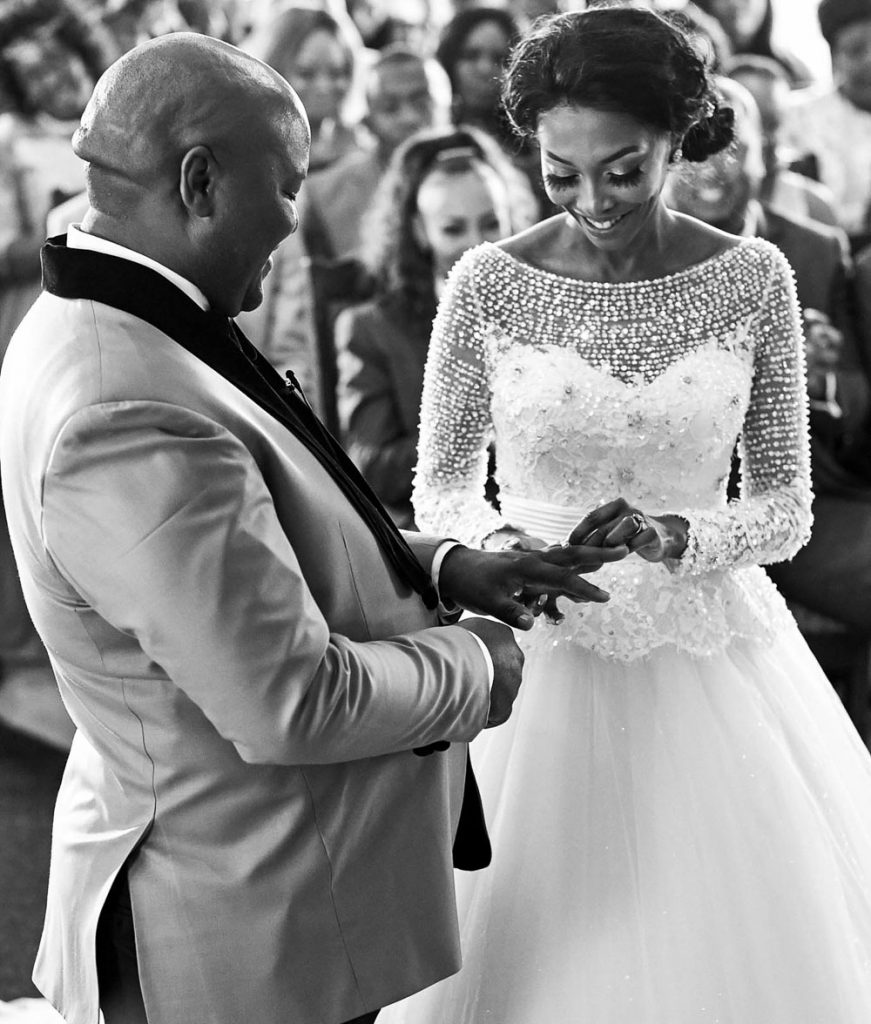 African couple exchanging rings at Thaba Eco Hotel wedding venue