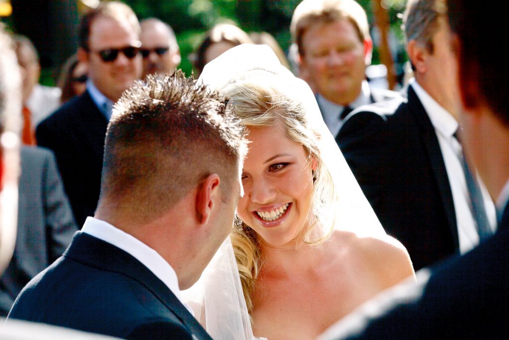 bride smiling at the groom at Longmeadow Farm