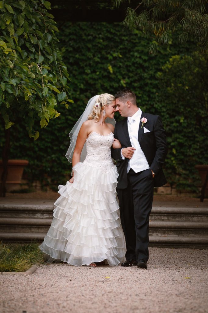 wedding couple walking hand in hand at Palazzo Hotel Montecasino