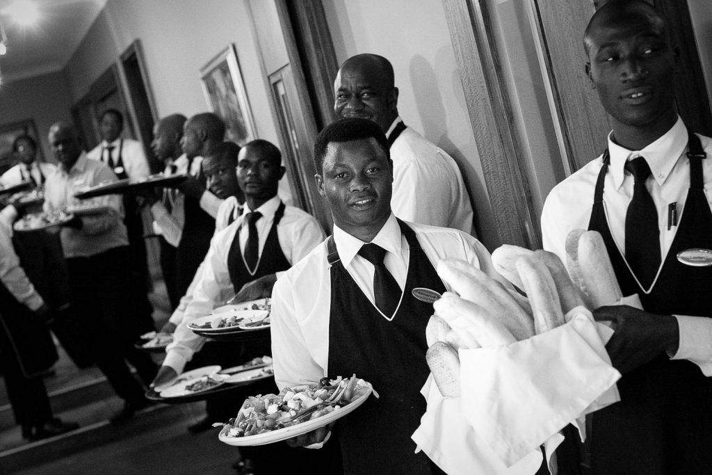 staff serving food at Longmeadow Farm Fourways