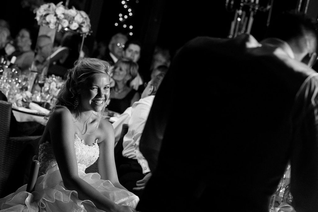 black and white image of bride laughing at the groom at Longmeadow Farm Fourways