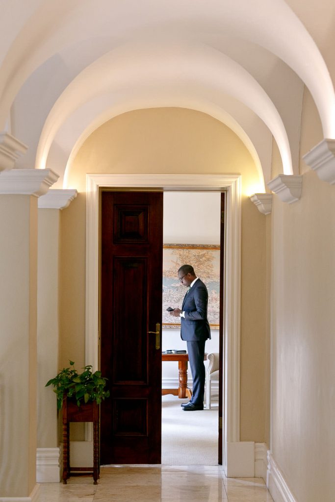 best man reading his speech notes at Le Chatelat in Sandhurst