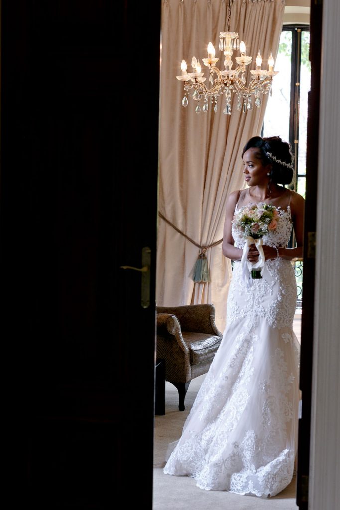 bride holding her wedding bouquet at Le Chatelat in Sandhurst