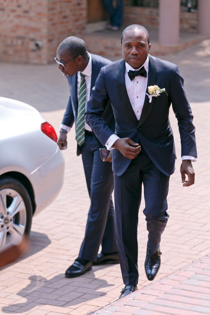 groom arriving for his wedding at a Rosebank church