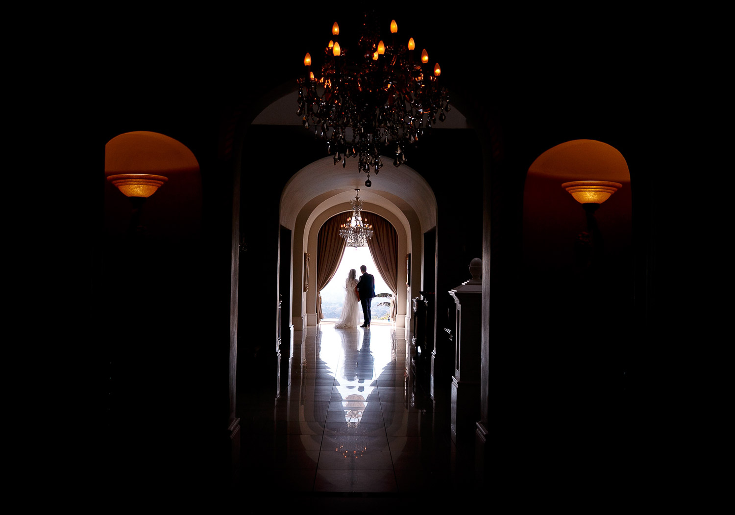 Bride and groom standing at the keyhole at the Munro Boutique Hotel wedding venue in Parktown Johannesburg