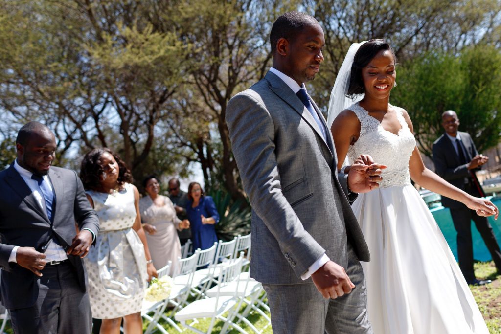 African wedding couple celebrating