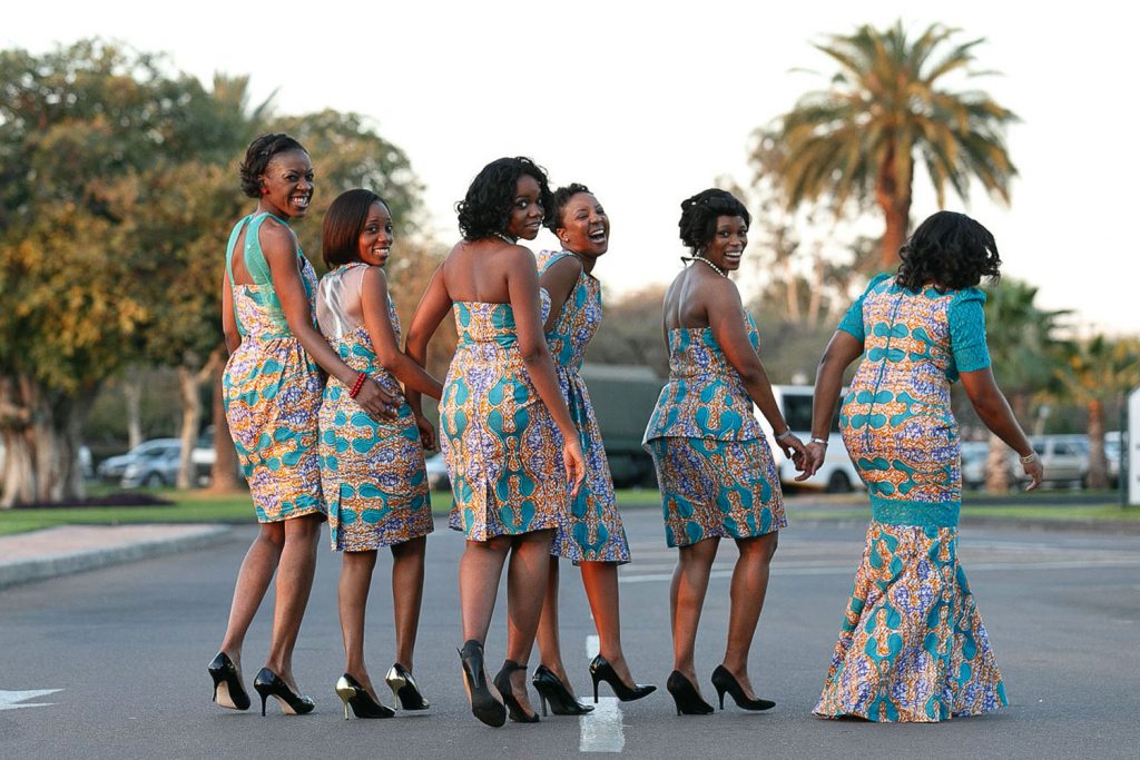 Bridesmaids walking outside on the road at Grand Palm Hotel Botswana