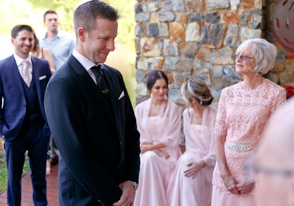 the groom veils the bride at Forum Homini