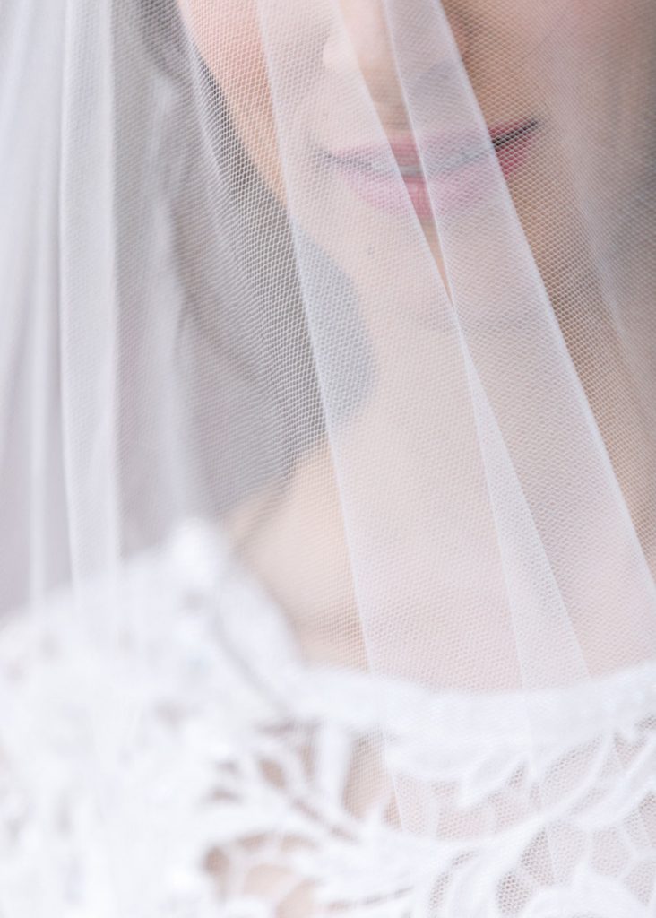 Jewish bride behind the wedding veil