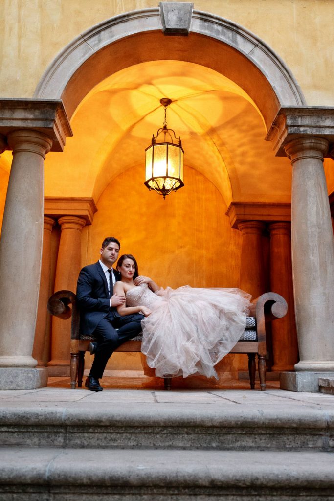 Jewish couple at The palazzo Hotel sitting under a warm light