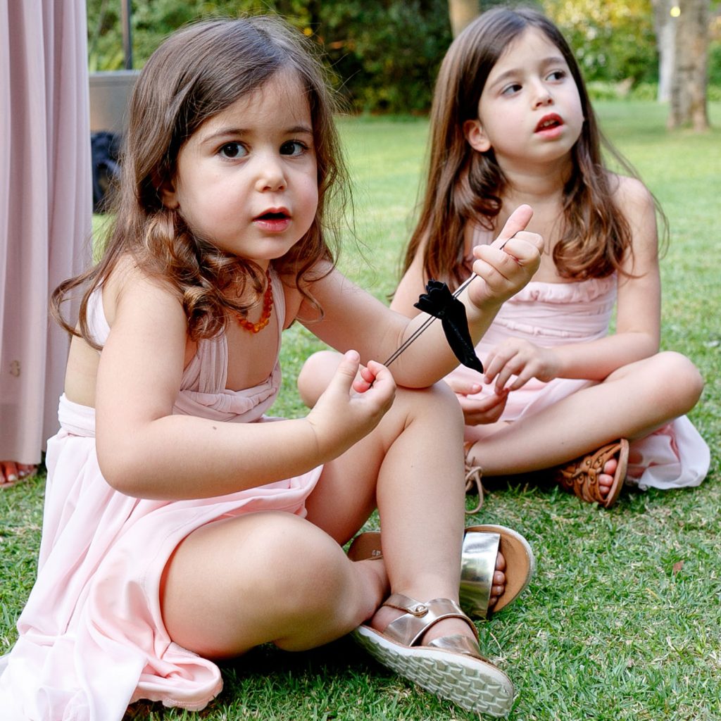 little girls in pink dresses at a Jewish wedding at The Palazzo Hotel