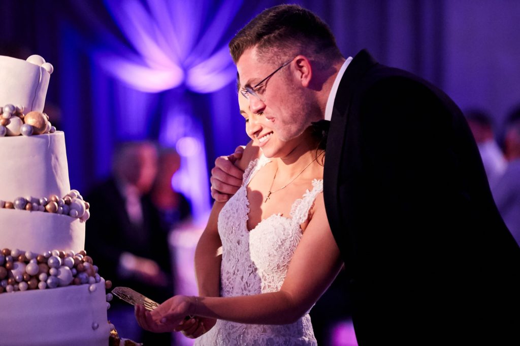 cutting the wedding cake at the Maronite Catholic Church