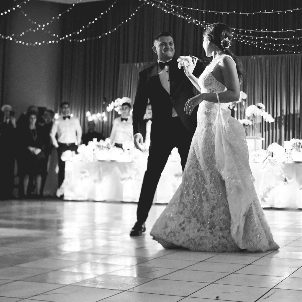 black and white dancing images at Lebanese wedding celebrations at Our Lady of Cedars on Woodmead