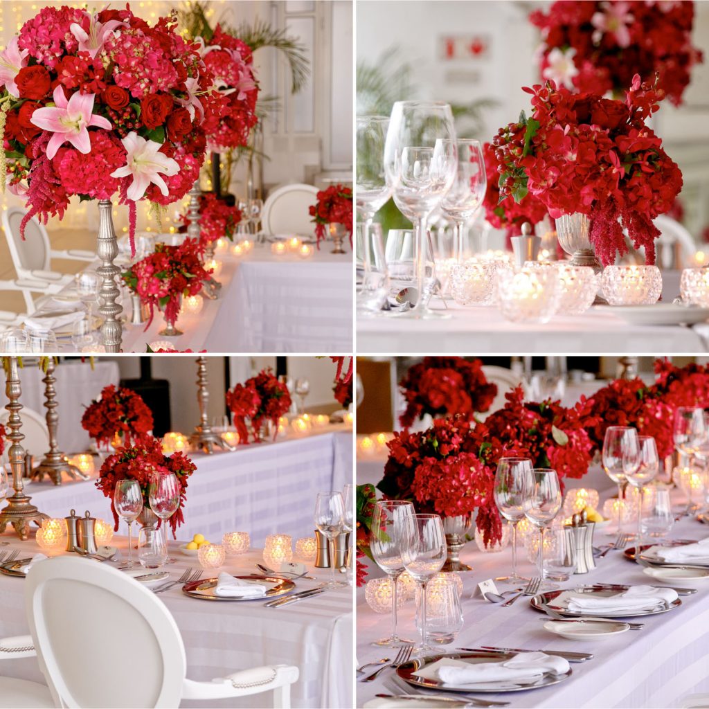 red flowers, long candles and white chairs for the wedding at 12 Apostles Hotel and Spa