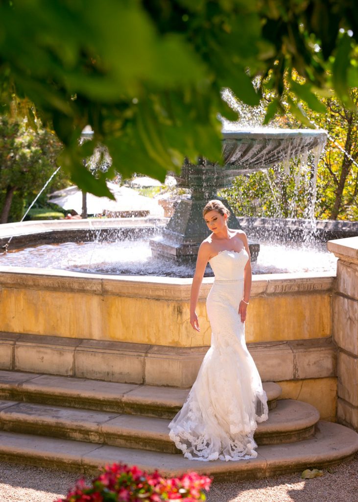 Johannesburg bride posing in front of the fountains at The Palazzo Hotel Montecasino in Johannesburg