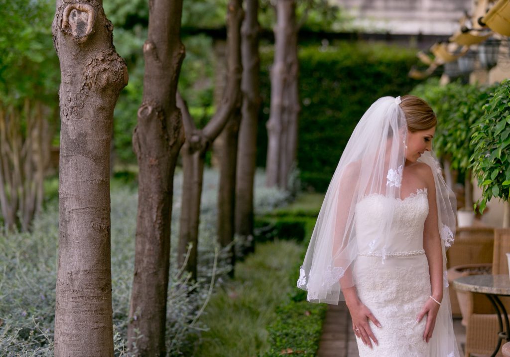 bride posing in the gardens at The Palazzo Hotel in Johannesburg