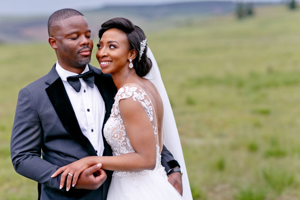 Natal Midlands Wedding couple smiling at their wedding photographer