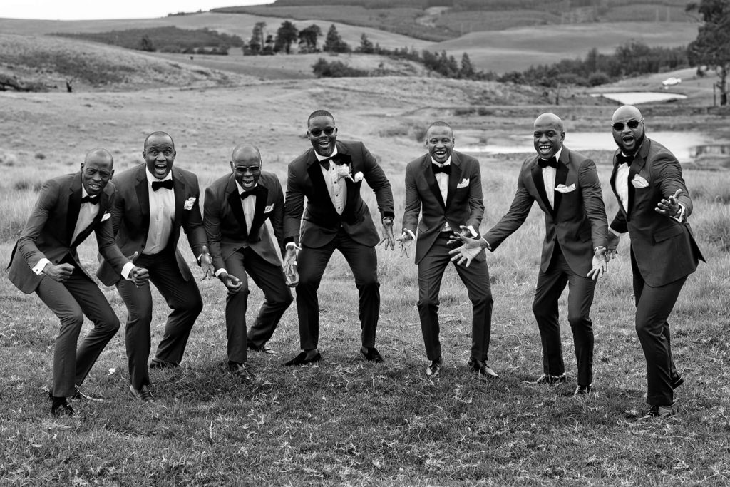 Groomsmen celebrating on the hill at Brahman Hills Nottingham in the Natal Midlands