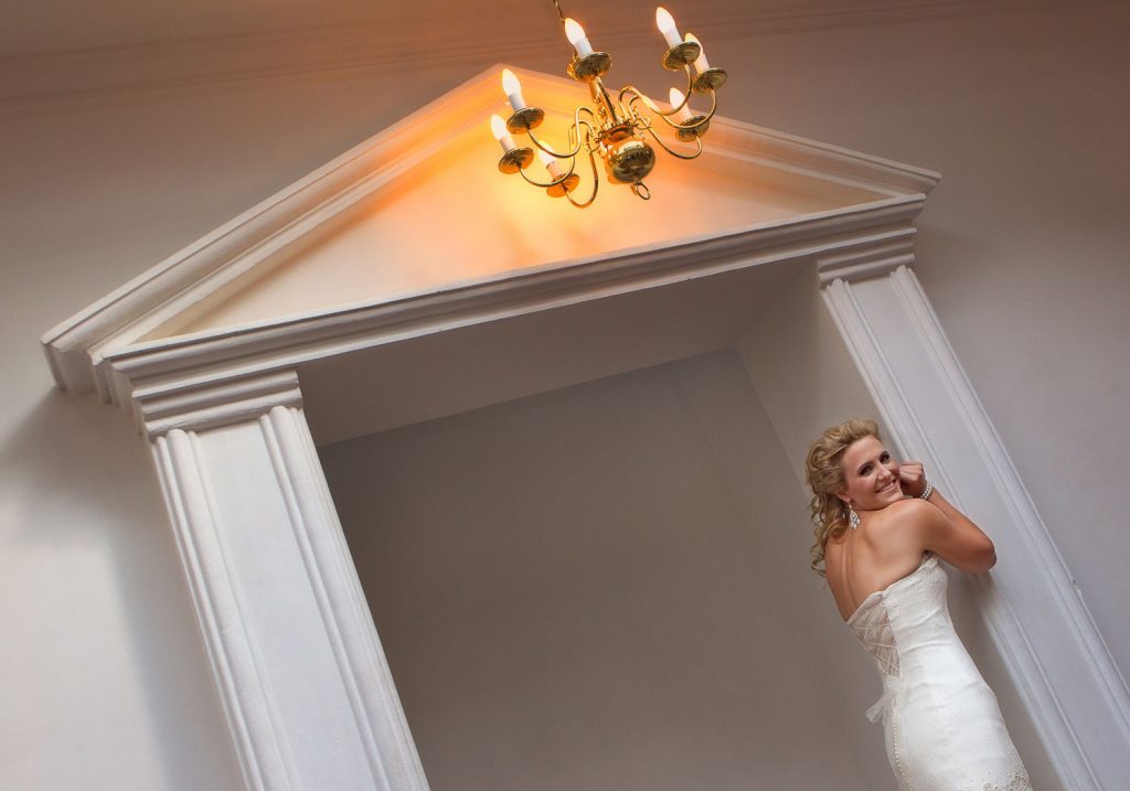 Shepstone Gardens wedding Photographer photographing the bride in a white wedding dress