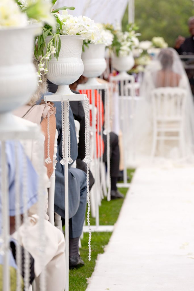 white flowers in white pots at Johannesburg wedding venue