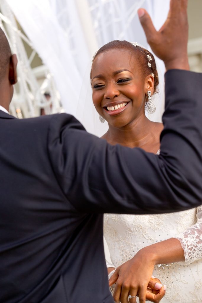 bride smiling at the groom