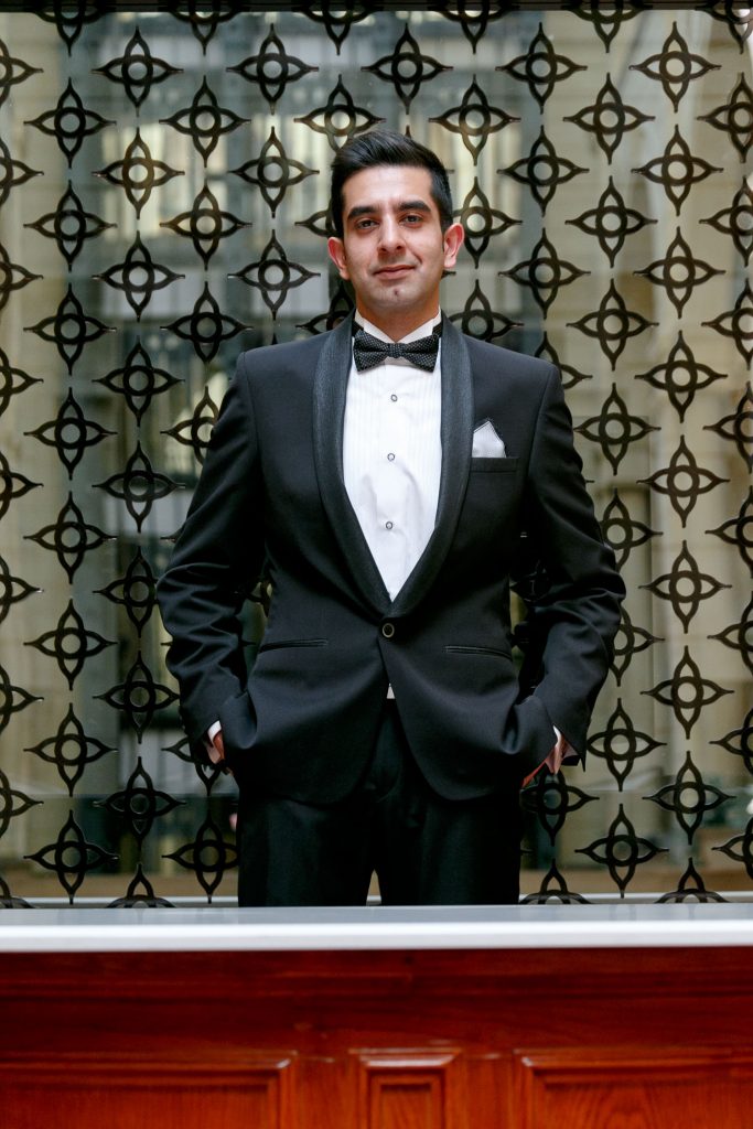 Groom in a black wedding suite at the Michel Angelo hotel Nelson Mandela Square