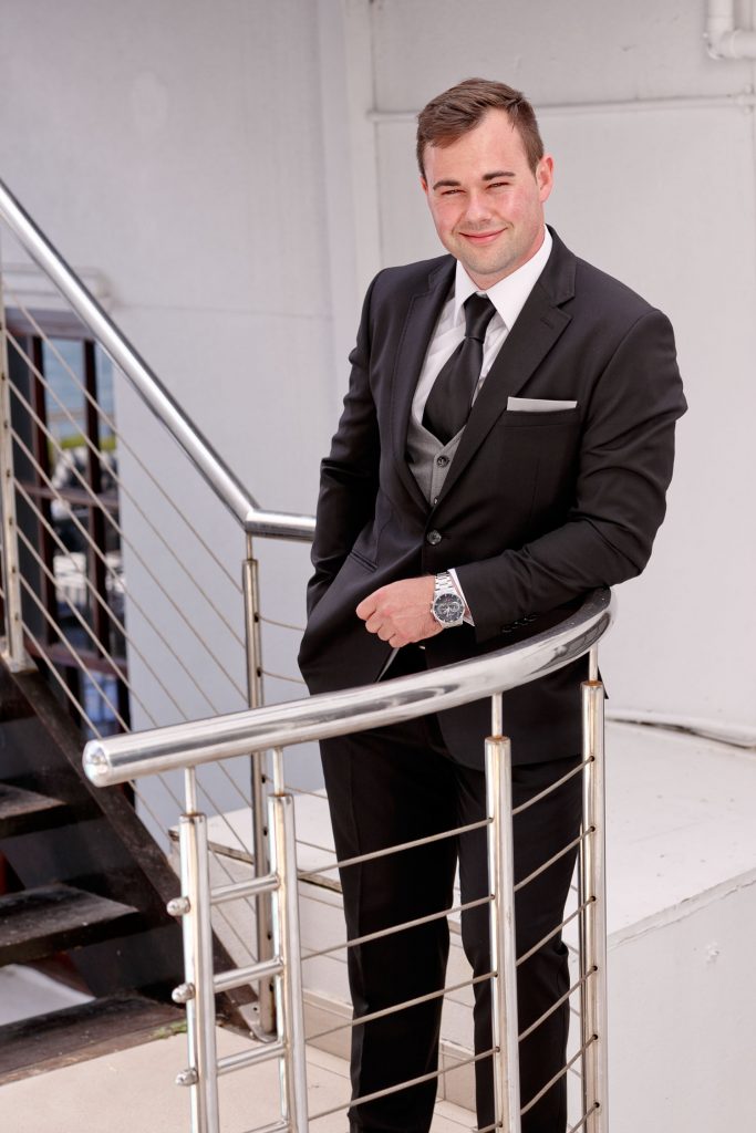 The Groom in a Black Suite at The 12 Apostles Hotel and Spa in Bantry Bay