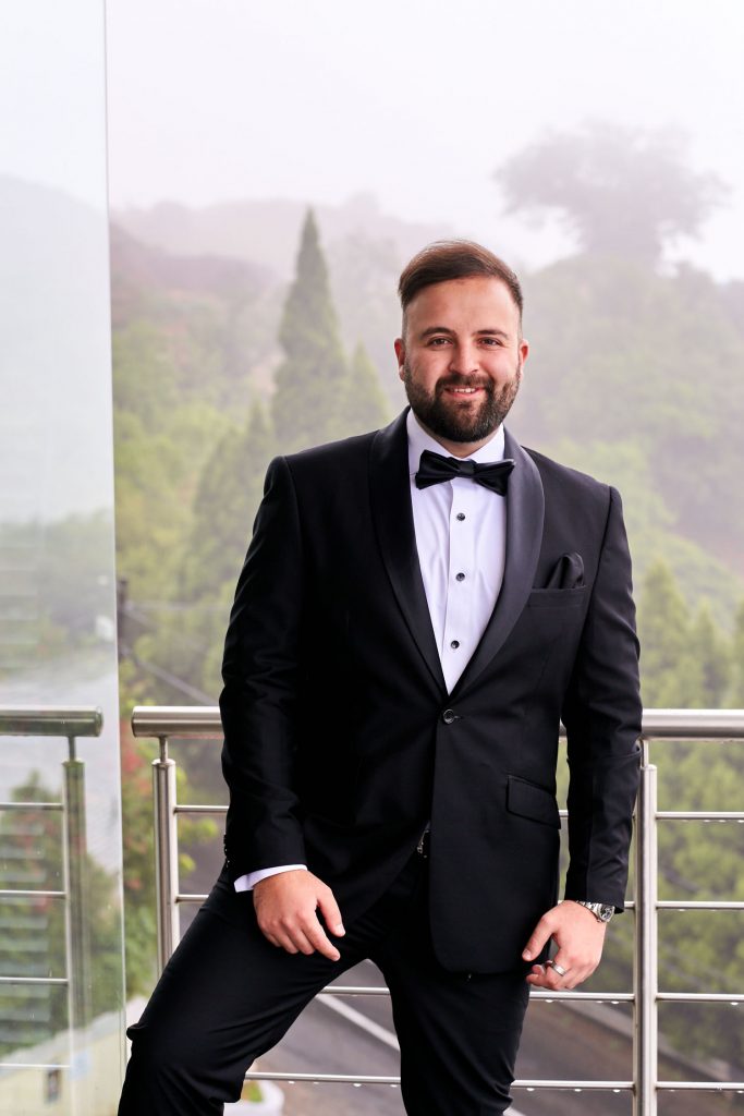 Groom Standing on a balcony at a Johannesburg Wedding Venue