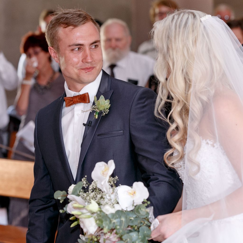 groom meeting the bride in church at Lezar Opstal Wedding Venue