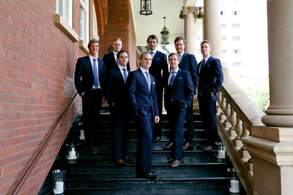 group shot of the wedding party standing on the steps at Emoyeni wedding and conference venue in Parktown Johannesburg
